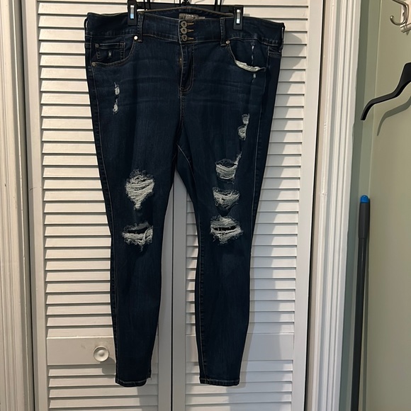 Torrid Denim - Three buttons and zipper front blue Jeggings from Torrid.